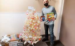 submarine with American flag above surface